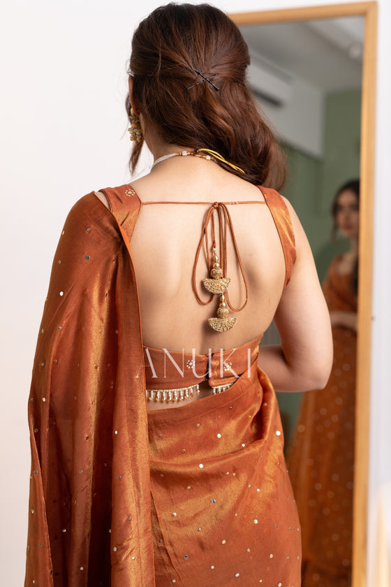 Shagun Rust Orange Tissue Silk Saree