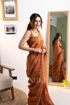 Shagun Rust Orange Tissue Silk Saree